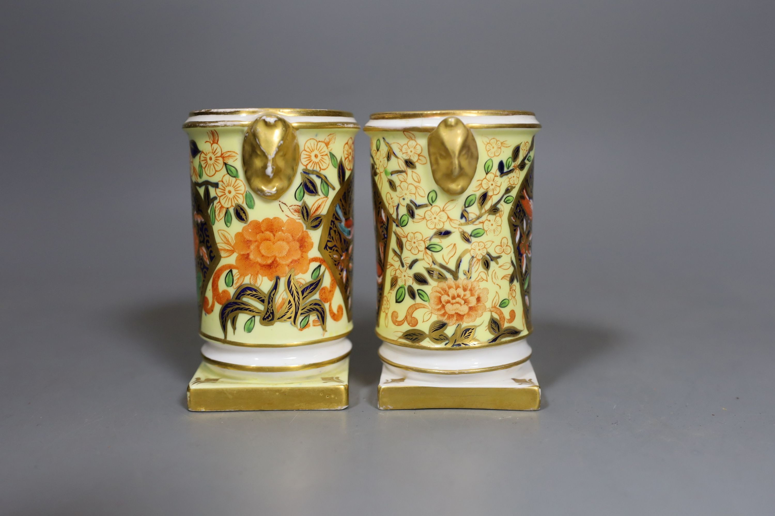 A pair of mid 19th century Crown Derby spill vases, 10cms high.